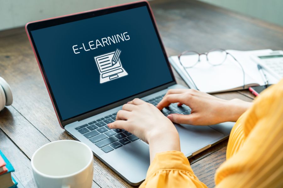 A person typing on a computer