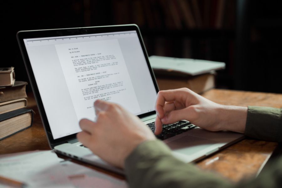 A person typing on a computer