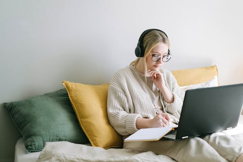 Free Photo of Woman Taking Notes Stock Photo