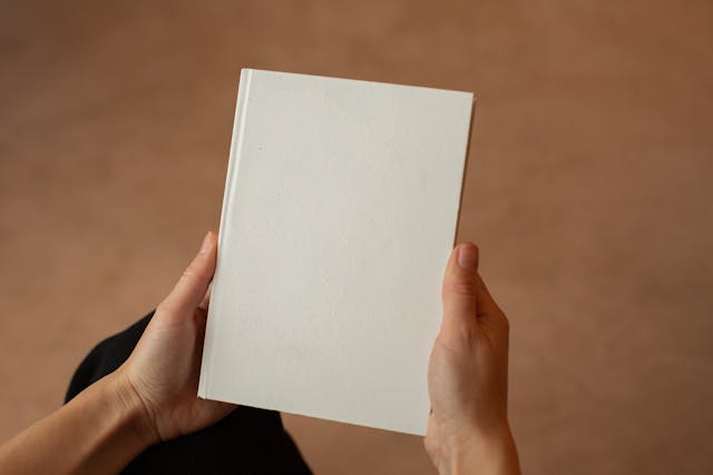 A man holding a book