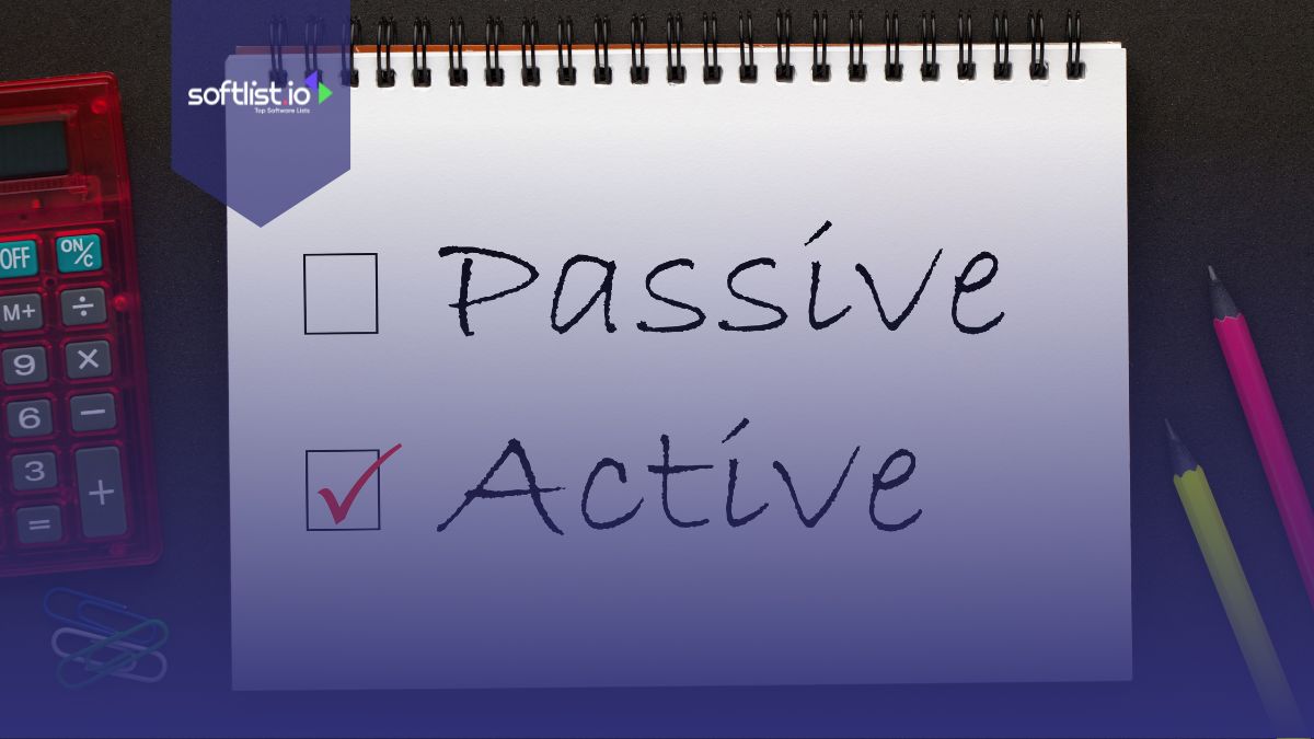 Passive and Active words written on a notepad with pencil and calculator on the side.