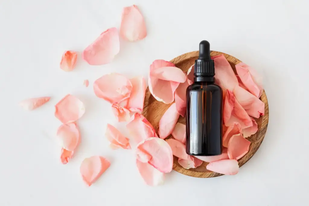 perfume with rose petals