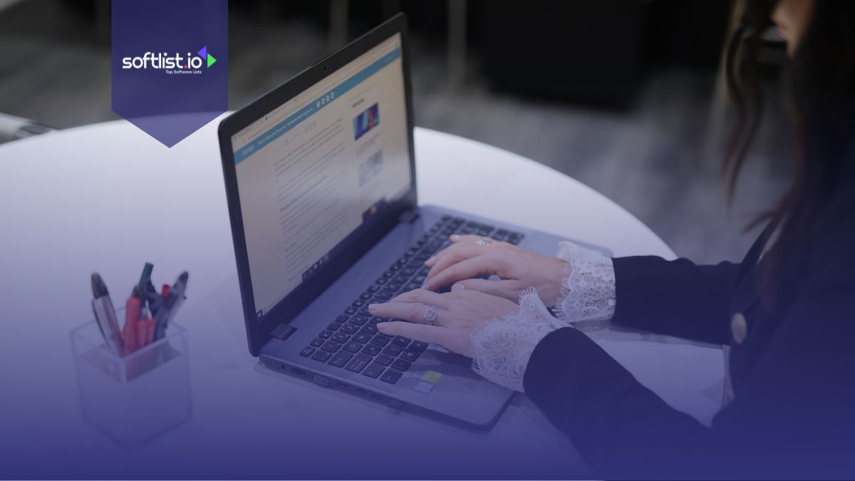 A woman using a laptop.