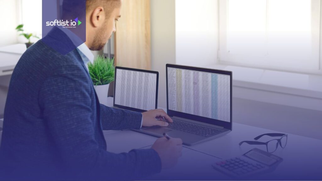 Busy concentrated male working in the office with excel spreadsheets