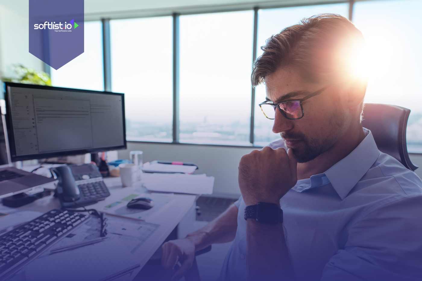 Investor analyzing market data on a computer in a modern office setting.
