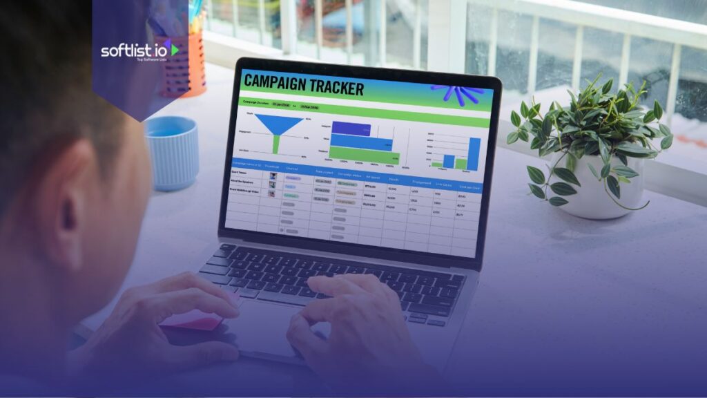 Person using campaign tracker on laptop.