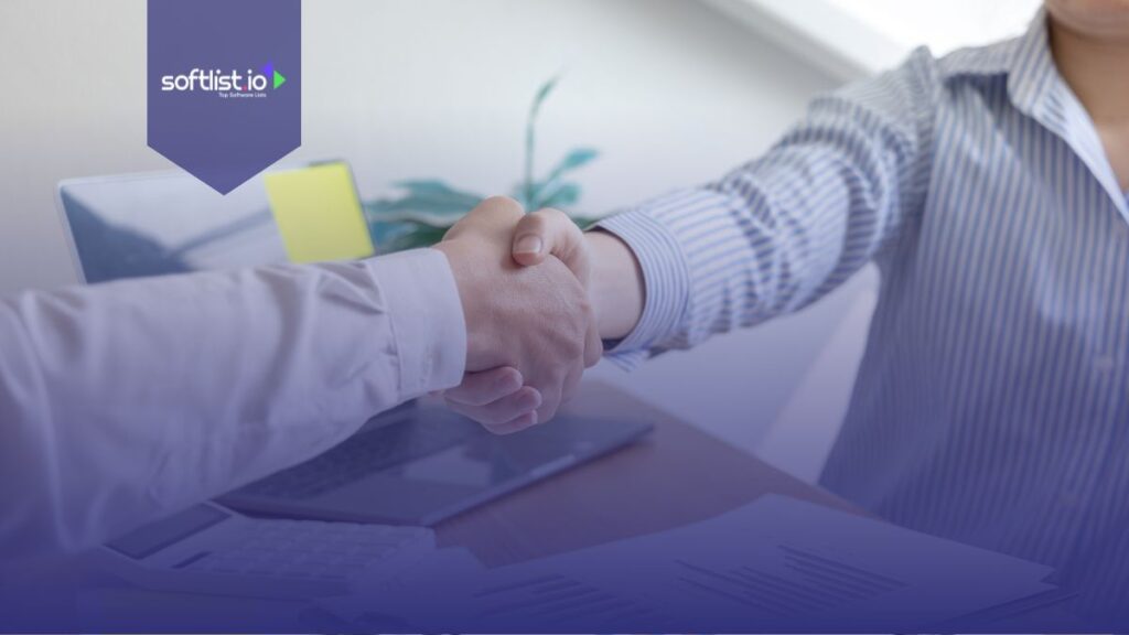 Business People shaking hands in an office.