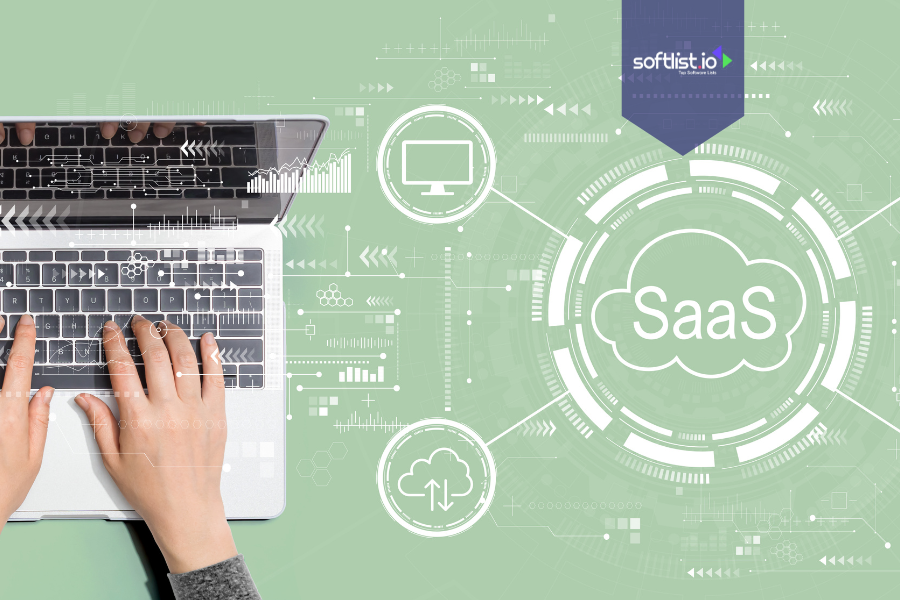 Hands typing on a laptop with digital SaaS graphics, representing the Micro-SaaS business model.