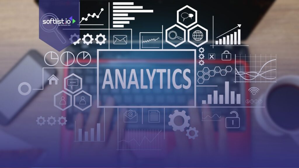 Analytics word with graphics tools with a laptop background.