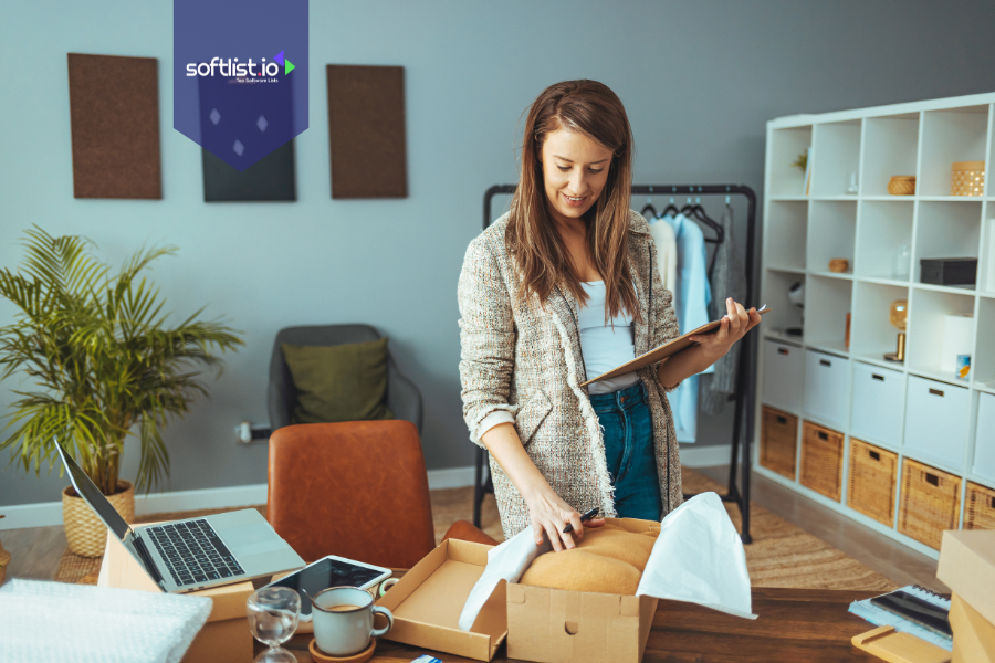 Woman managing clothing inventory and online store, representing how to sell an online business.