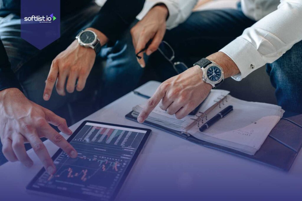 Business team analyzing financial data and charts